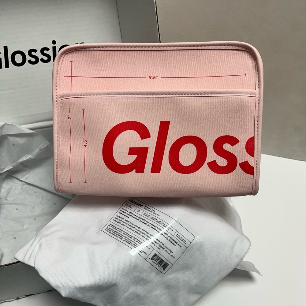 Brand new Glossier cosmetic bag 
Will ship in original packaging/box